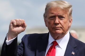 trump with fist up