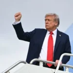 trump raising fist