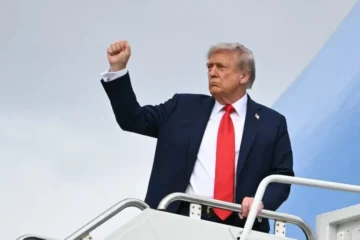 trump raising fist